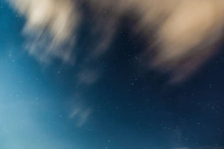 Night sky magic cloud. Infinity Blue Background and Shining Stars. Long time cadreの写真素材