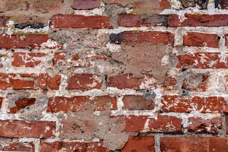 Rough ancient masonry. Background of old bricks. Ancient wall. Vintage background. Of the 19th...