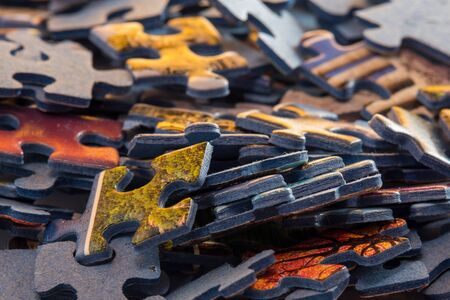 Bunch of unsorted puzzle piecesの写真素材