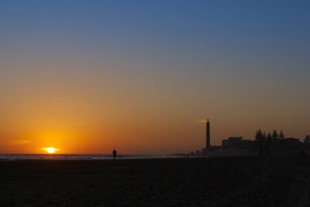 Lighthouse at Maspalomas Beach, Gran Canaria in the eveningの写真素材