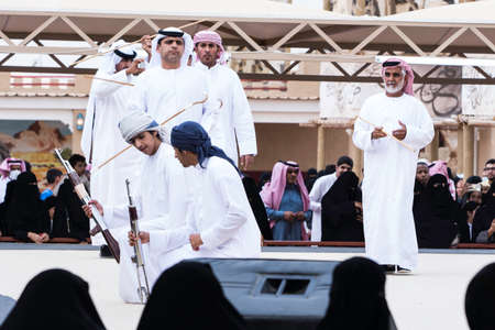 Emirates men perform a Yawalah traditional dance in Janadriyah Festival Essay February 23, 2018 in Riyadh, Saudi Arabiaのeditorial素材