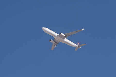 Riyadh, Saudi Arabia, KSA - January 05, 2018 Saudi Arabia Airlines plane in Riyadh sky