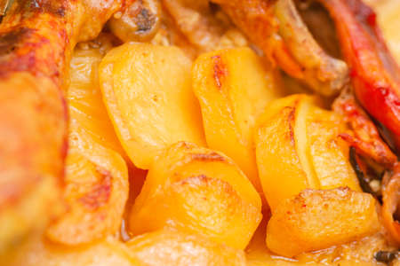 Closeup to Potatoes with Chicken cookedの写真素材