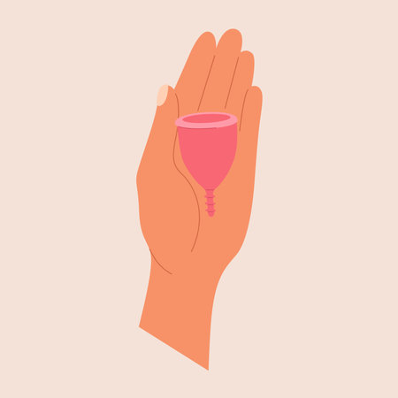 Woman hand holds menstrual cup. Health care product. Hygiene in periodのイラスト素材