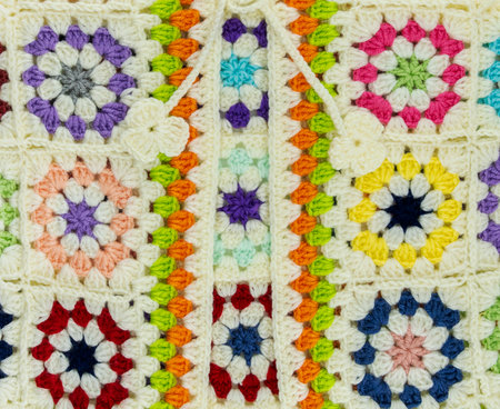 Handmade woolen children's sweaters. Wool sweaters decorated with various colors and interesting...