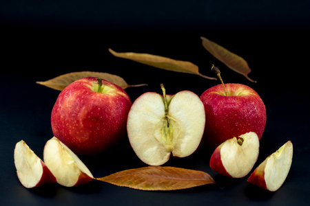close-up apple fruit on black background