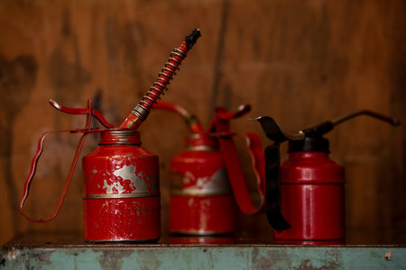 Old fire extinguisher on old wooden background. Copy space for text.の写真素材