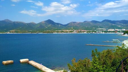 View of the sea and the mountains on a summer dayの写真素材