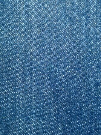 Background of blue denim with gradient, textureの写真素材