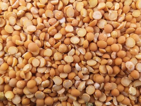 Orange dry peas - abstract background, texture. Abstract structure.の写真素材