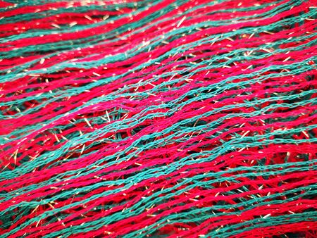 Beautiful bright background of juicy pink and blue threadsの写真素材
