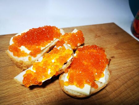 Appetizing red caviar sandwiches. Festive breakfast. Delicious breakfast.の写真素材