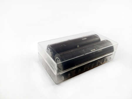 Battery packs in a transparent box. Isolate.の写真素材