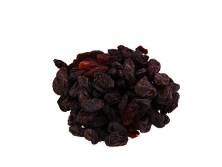 Appetizing raisins lies in a transparent plate on a white backgroundの写真素材