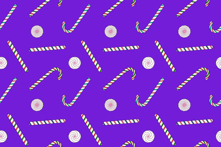 Festive seamless pattern with colorful candy canes and round peppermint candies, perfect for Christmas and New Years designs.のイラスト素材