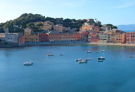 View from rock on Bay of Silence, fishing cove of town of Sestra Levante, Italy. Tourism and recreation. Ecologically clean nature. Traditional old buildings. Historical center. High quality photoの写真素材