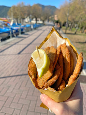 Anchovies fried in oil. Traditional local fish dish. Bunch of food at sea. Fast food. Italy, Liguria and national meals. . High quality photoの写真素材
