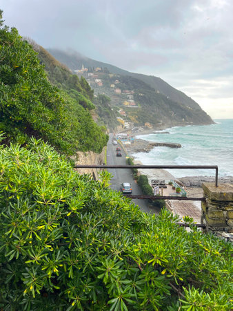 Moneglia, Italy - 09 January 2025. Old park by sea. Overcast weather, fog. Plant and tree. Stone wall, building in Italy. Municipality of Moneglia, Liguria region. View from mountain. . High qualityの写真素材
