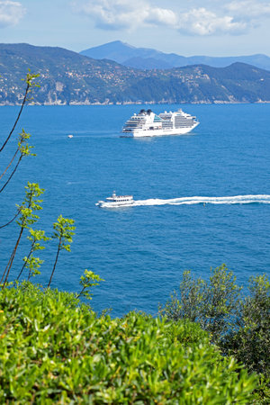 Tourist cruise liner in bay of Porto Venere, Liguria. Sea and holidays in Italy. Background for design. . High quality photoの写真素材