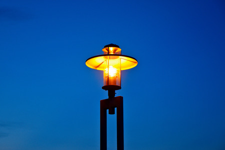 Street lamp isolated on blue skyの写真素材