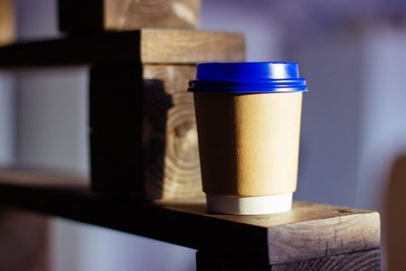 Paper Cup with blue lid for coffee or tea.の写真素材