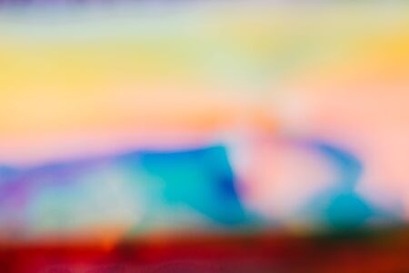 Colored fluid. Beautiful blurred pink, blue, yellow background. Abstract bright background...