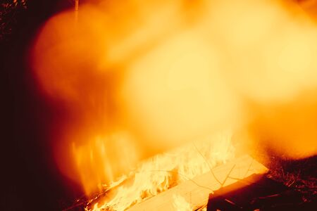 Flames on black background, abstract effect. Real fire with blurred effect or bokeh style.