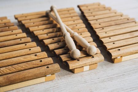 Xylophone is made of natural wood. Wooden sticks for musical instruments. Musical instrument made of natural wood without the use of plastic.の写真素材