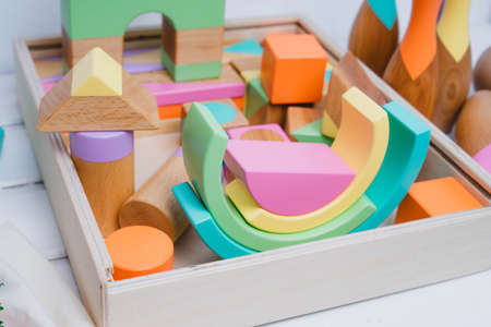 Skittles and a ball made of natural material. Bowling for children made of wood. Set for bowling....