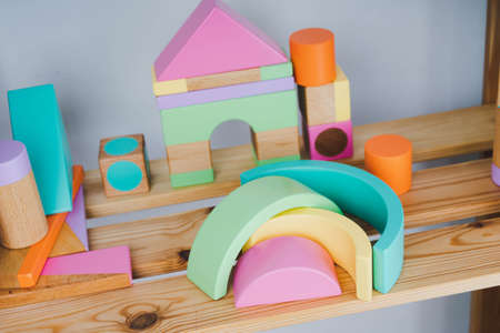 Wooden constructor for children. Colorful toys made of natural materials. Zero waste. Developing...