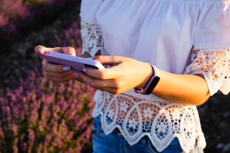A girl in a lavender field caught the internet. I have a smart watch with a purple strap and a...
