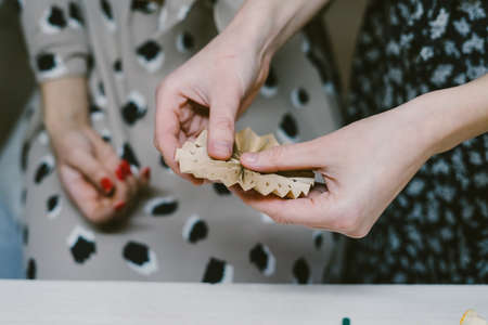 Creating hand made christmas ornaments. The origami stage.の写真素材