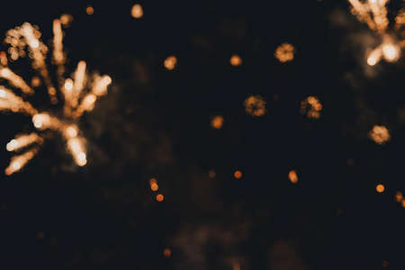 Abstract photo of fireworks. Salute without focus. Blurry photo of fireworks. Festive fireworks. A...