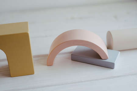 Toys for children made of natural material. Wooden parts from the constructor. Cubes, blocks and...