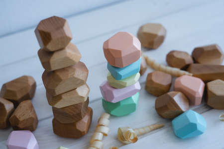 A toy made of natural wood. Unusual cubes for developing games with children. children's game....