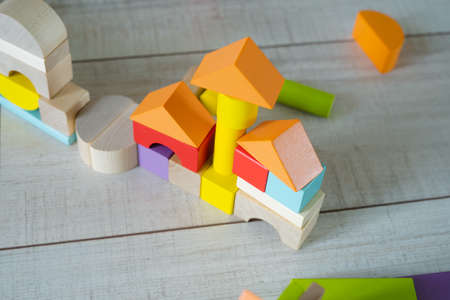 Children's construction kit made of natural wood. Eco-friendly toys for kids. The composition is...