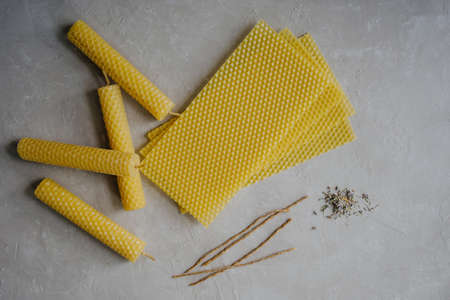 Set of Natural honey wax candles. Create candles. Waxed candle wicks. Dried lavender.の写真素材