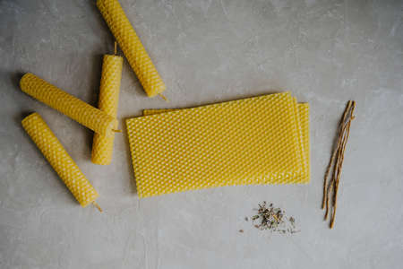 Set of Natural honey wax candles. Create candles. Waxed candle wicks. Dried lavender.の写真素材
