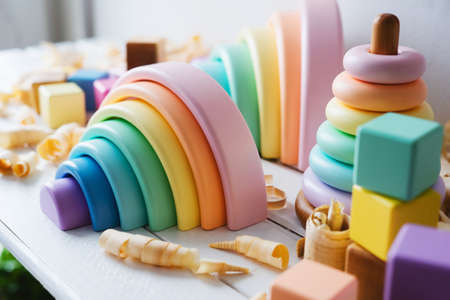 Childrens wooden toys. Rainbow made of natural wood. Zero waste concept.の写真素材