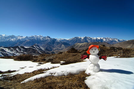 Snowman in Himalayas and Mountain Chain at the Backgroundの写真素材