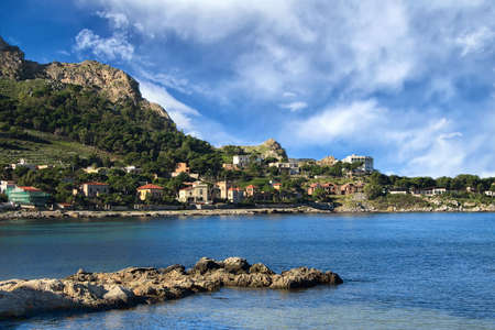 View to the coastal city from the waterの写真素材