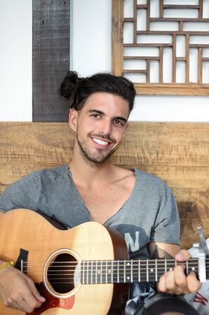 ARRAIAL DO CABO, BRAZIL, 5 SEPTEMBER 2016: Ivo Mozart smiling and playing guitarのeditorial素材