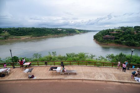 PUERTO IGUAZU, AGRENTINA, 28 NOVEMBER 2016: aerial view to craft market at the embankment at the border of 3 countriesのeditorial素材