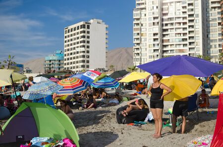 IQUIQUE, CHILE, 14 JANUARY 2017: people ssunbathing at the main beach of the cityのeditorial素材