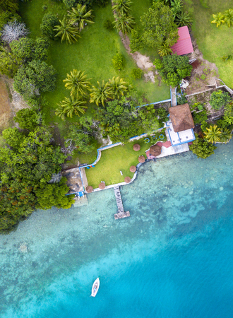 BACALAR, MEXICO, 04 OCTOBER 2017: aerial view to the shore with hotels, beaches and white sailing yachtのeditorial素材
