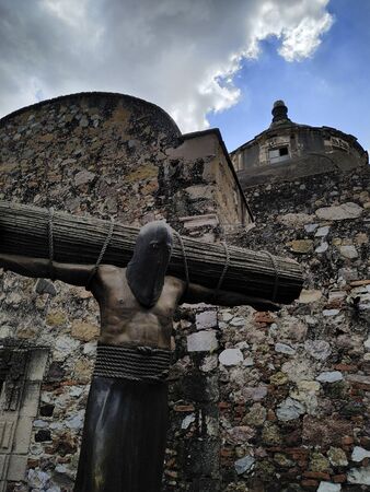 TAXCO, MEXICO, 20 MARCH 2019:  statue in front of temple in downtown of Taxcoのeditorial素材