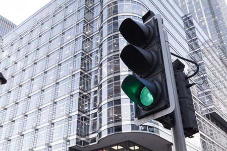 Green, Yellow and Red Traffic Light in the London cityの写真素材