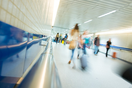 London Train Tube station Blur people movement in rush hour, at King's Cross station, England, UKのeditorial素材