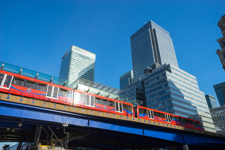 LONDON ENGLAND - APRIL 14, 2015: DLR (Dockland Light Railways) is  opened in 1987 to link all dockland areas.  This picture is taken in the business zone, Canary Wharf, in Londonのeditorial素材