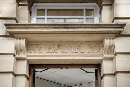 Bank Sign , Stone Backgroundの写真素材